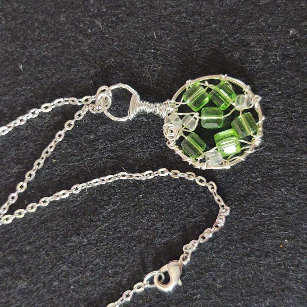 Handwired in sterling silver green glass beads I'm listening hun